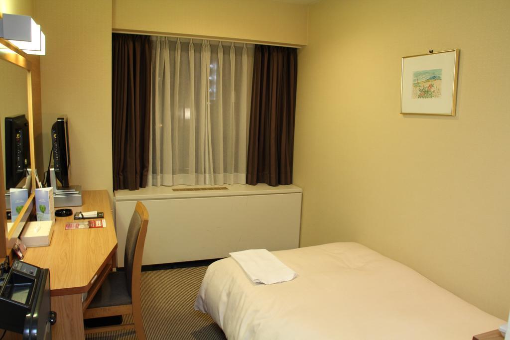 Hotel Sunroute New Sapporo Rum bild