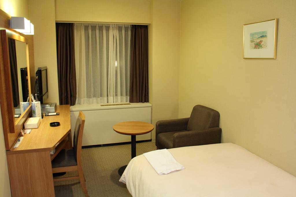 Hotel Sunroute New Sapporo Rum bild