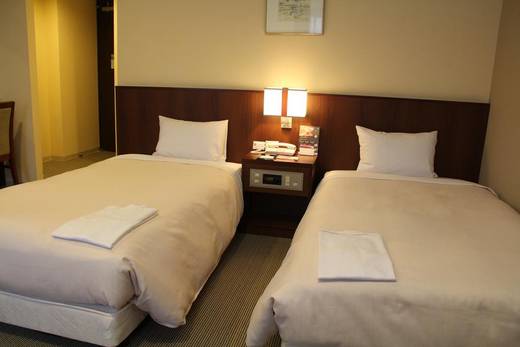 Hotel Sunroute New Sapporo Rum bild