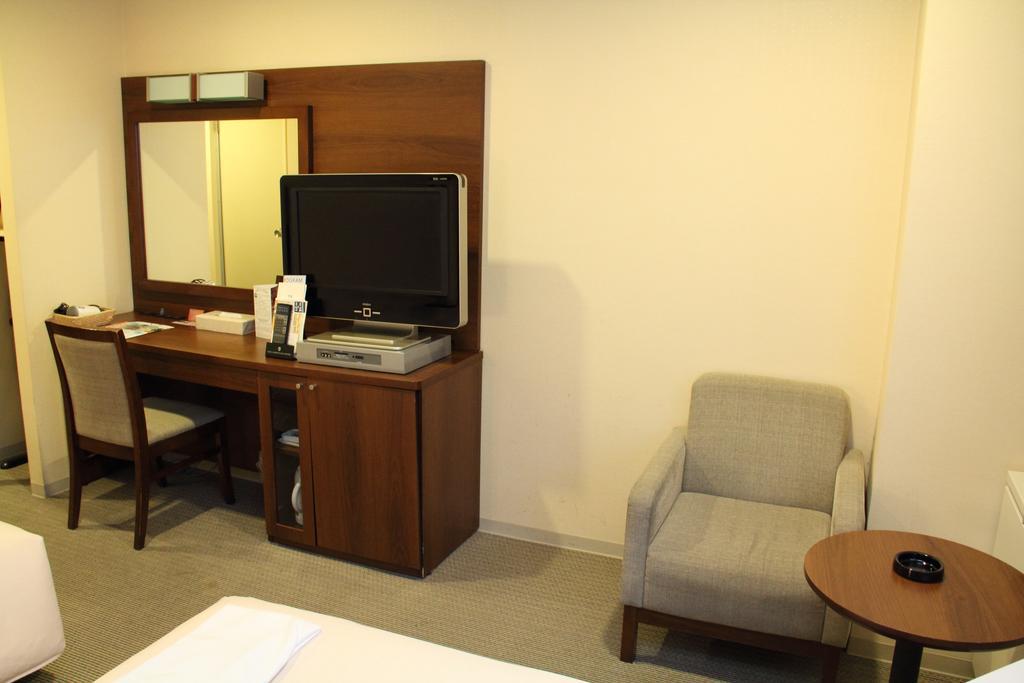 Hotel Sunroute New Sapporo Rum bild