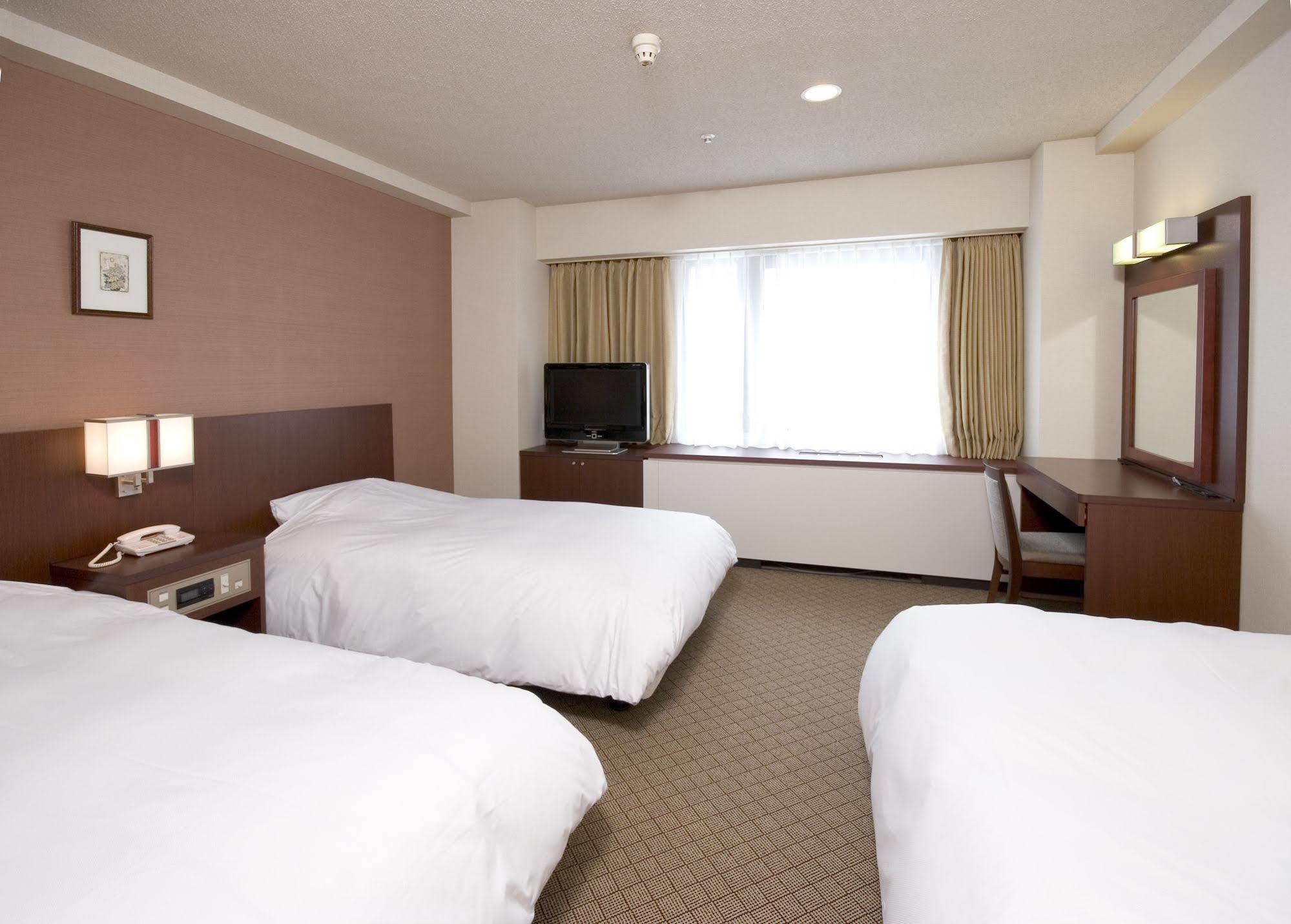 Hotel Sunroute New Sapporo Exteriör bild