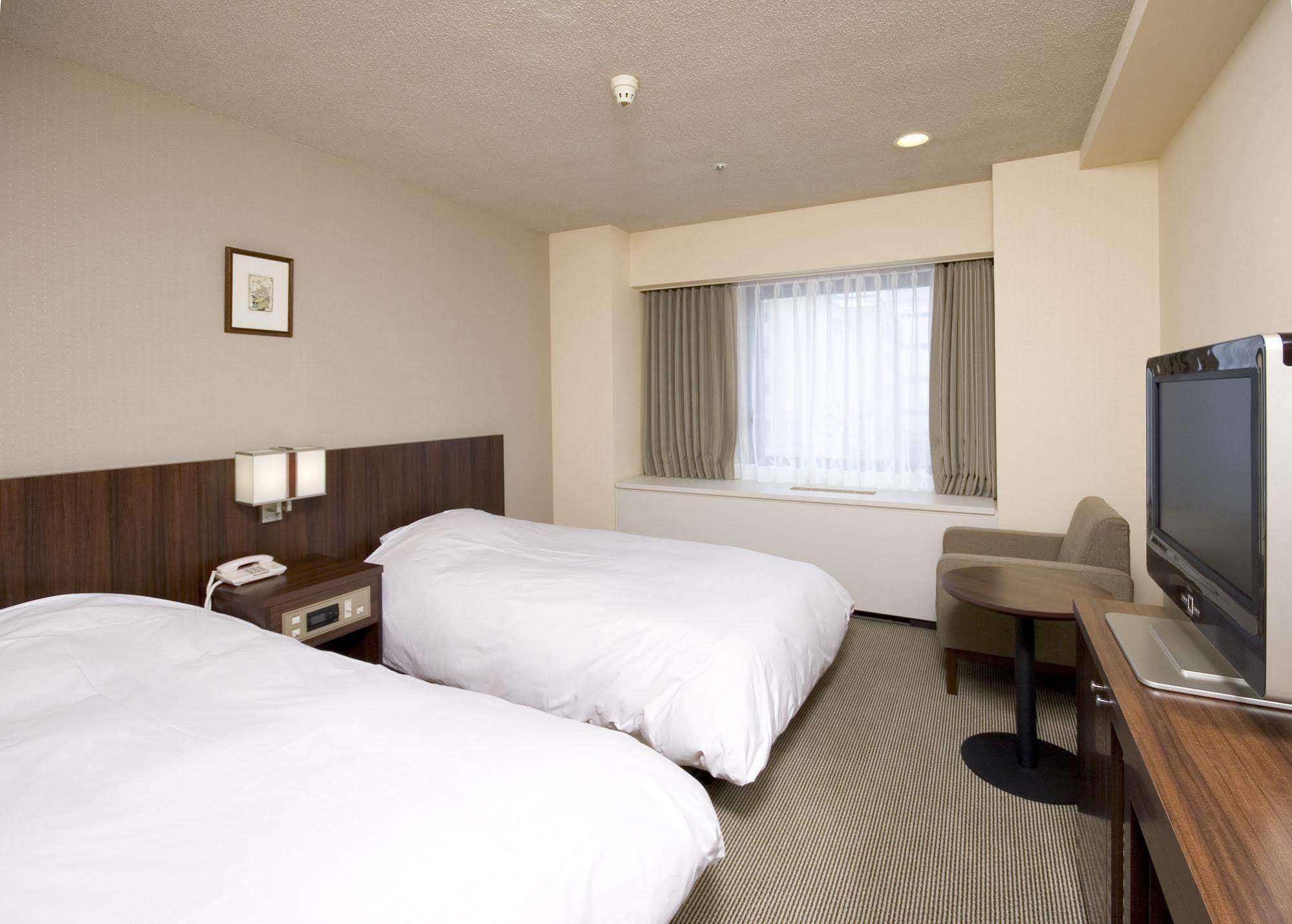 Hotel Sunroute New Sapporo Exteriör bild